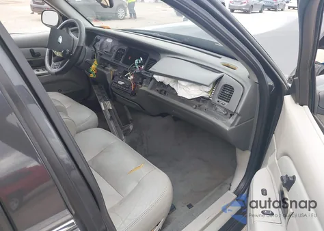 2004 Ford Crown Victoria Lx z USA, uszkodzony, nr VIN 2FAHP74W74X156121